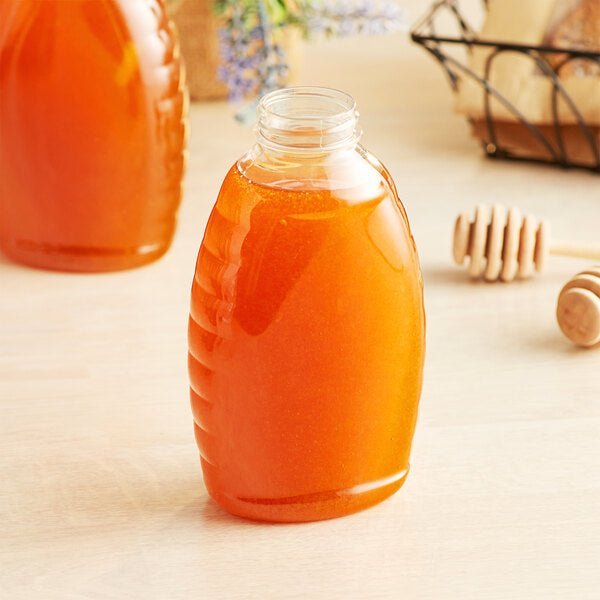 16 oz. (24 oz. Honey Weight) Classic Queenline PET Honey Bottle - 195/Case - Bitterroot Buzz Bees