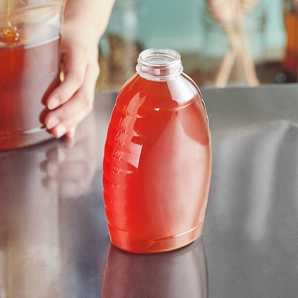 22 oz. (32 oz. Honey Weight) Classic Queenline PET Honey Bottle - 159/Case - Bitterroot Buzz Bees