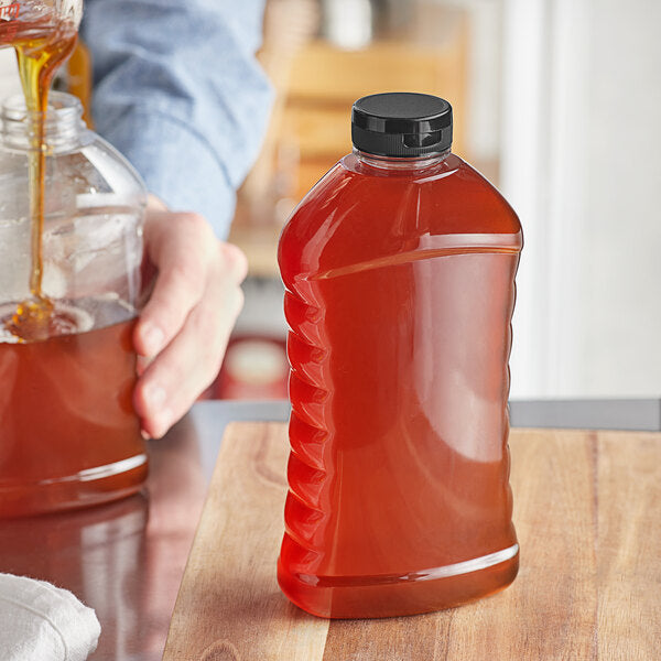 Ribbed Hourglass PET Honey Bottle with Pressure Sensitive Liner Black Plastic Flip Top Lid